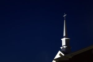 stories from our churches - steeple against night sky