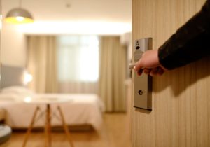 door opening into clean hotel room