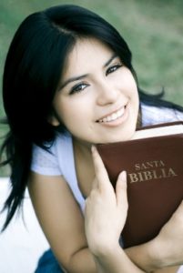 Spanish-speaking woman with Bible
