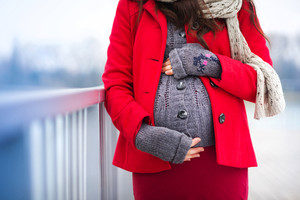 pregnant woman outside in winter