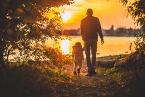 dad and child in sunset